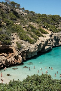 A vibrant group of travelers enjoying a sunny day tour along the turquoise coast of Diego Suarez.