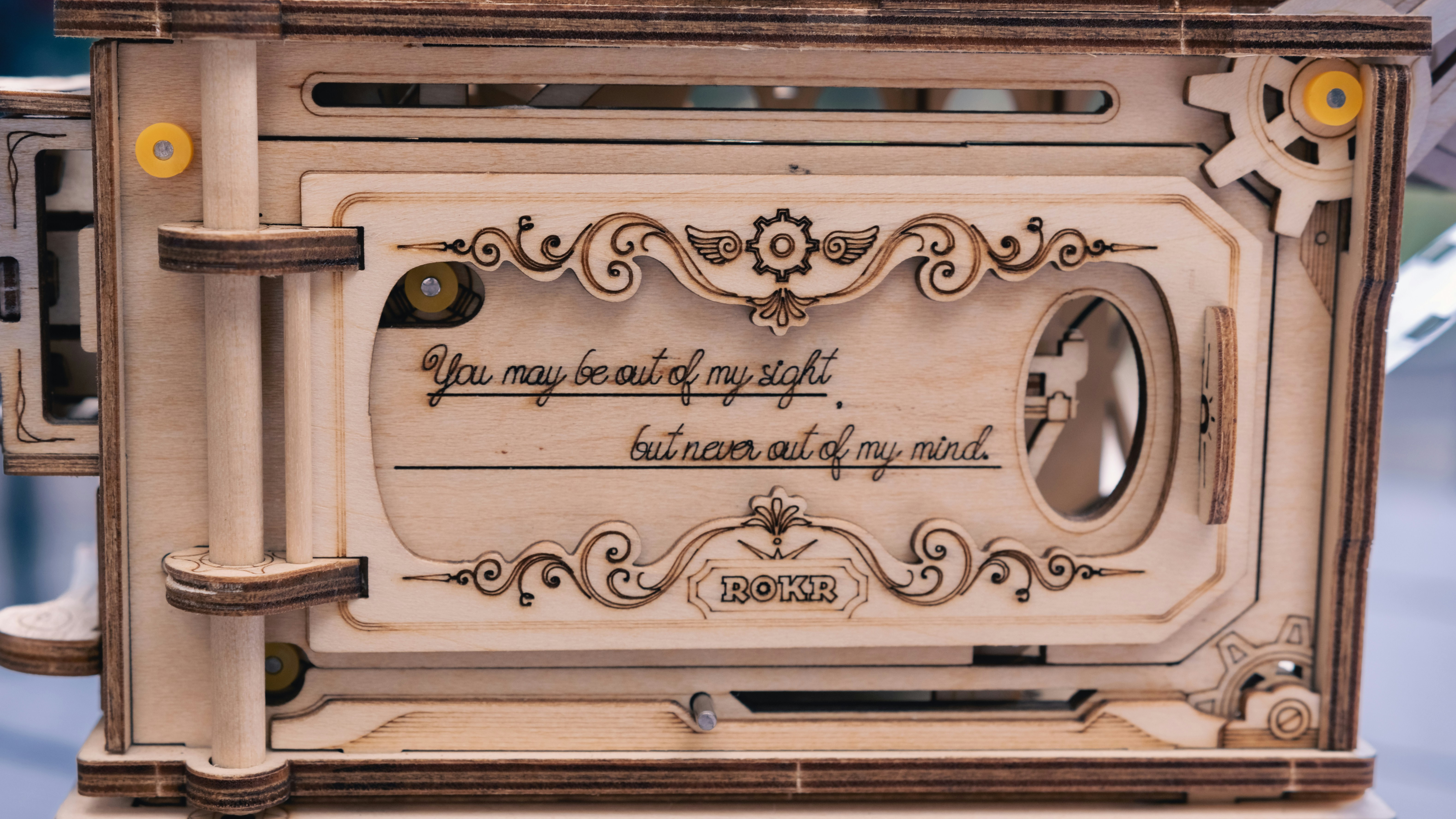 a close up of a clock with a quote on it