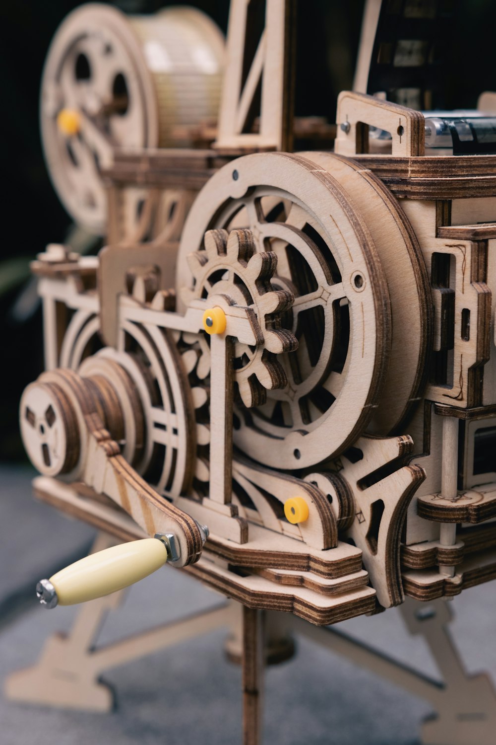 a close up of a wooden model of a machine