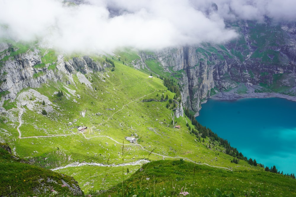 a view of a mountain with a lake in the middle of it