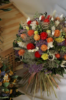 a bouquet of flowers sitting on top of a table