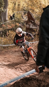 Participants racing through a challenging mountain trail during an event.