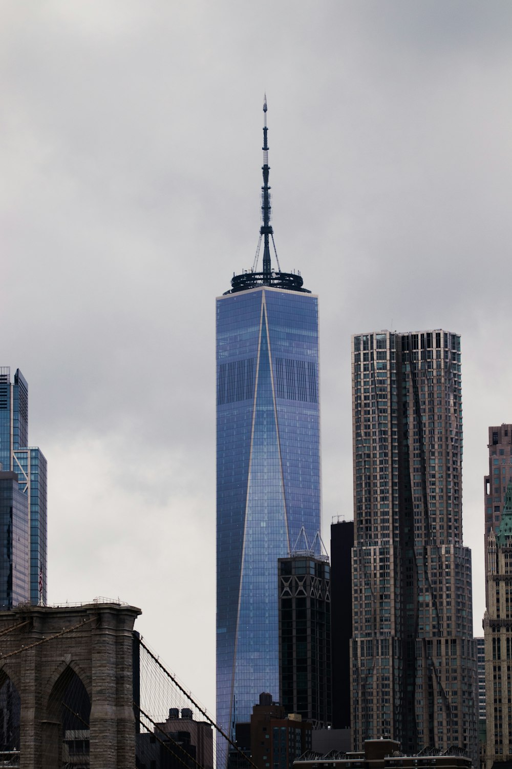 a very tall building in the middle of a city