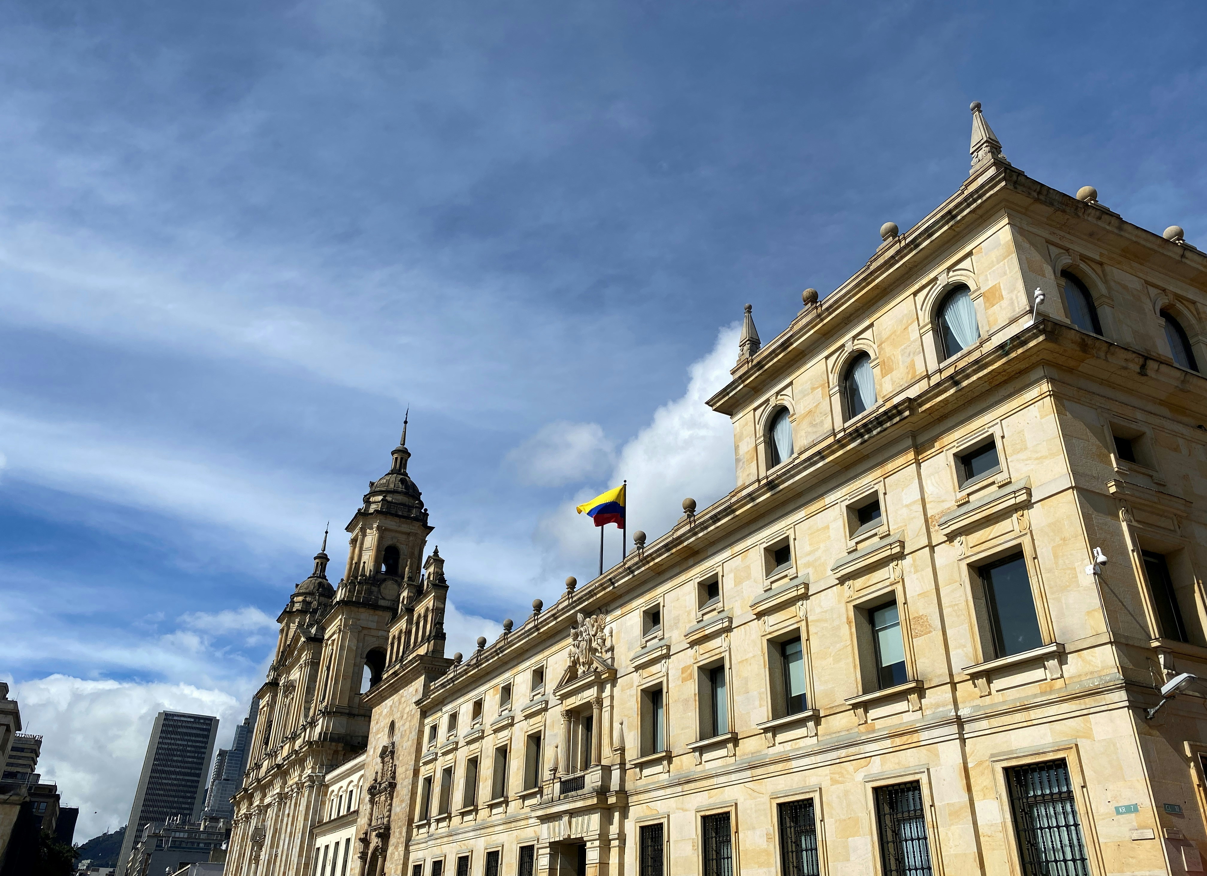 a large building with a flag on top of it