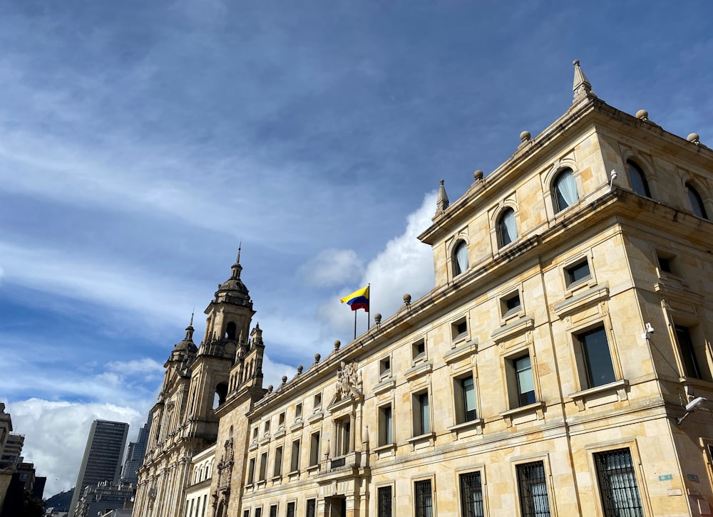 a large building with a flag on top of it