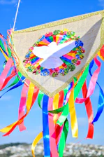 A serene purple and red gradient background with a glowing white dove symbolizing peace and healing.