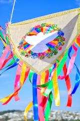 A colorful banner supporting unity among Canadian Buddhist communities displayed at a cultural festival.