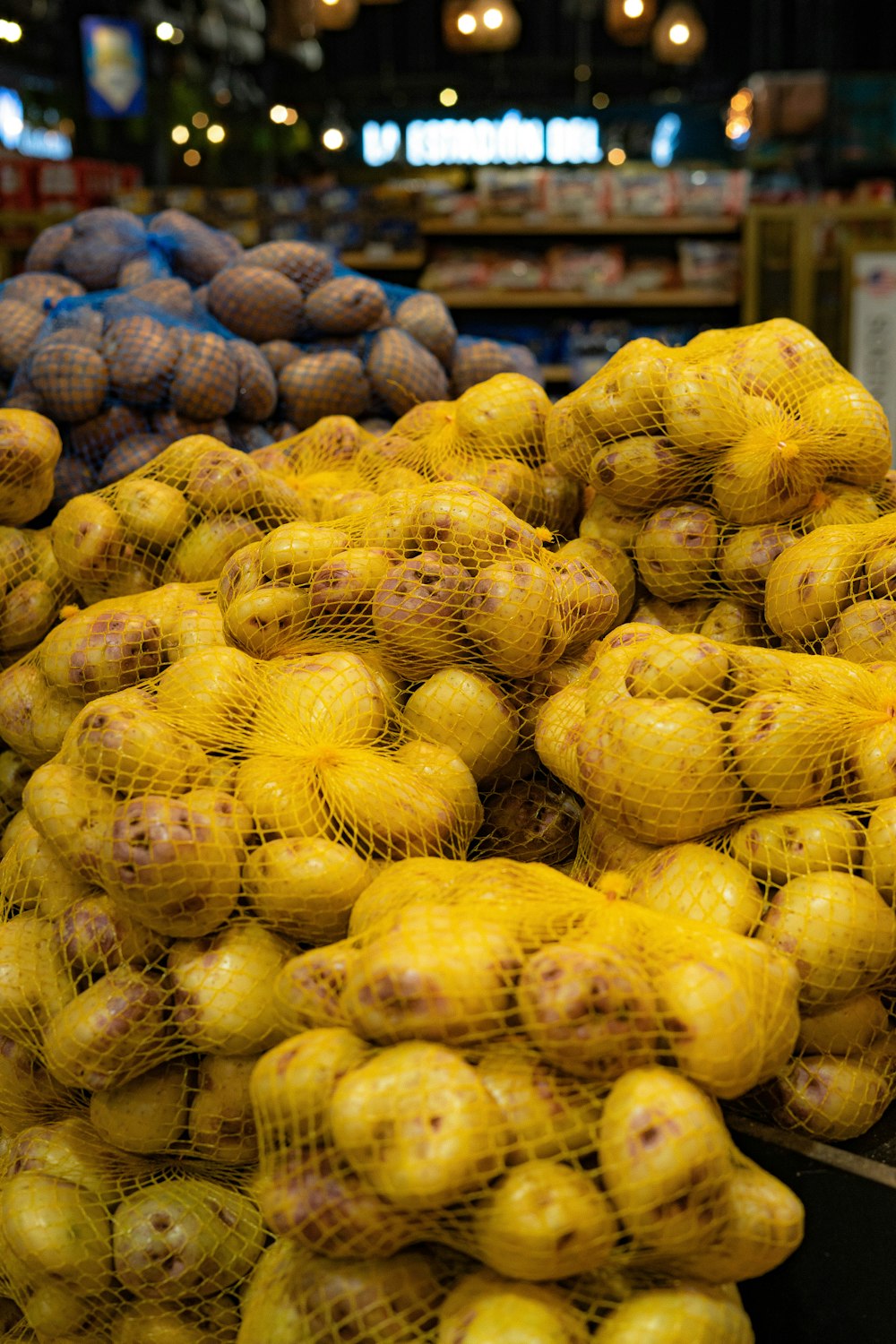 a pile of potatoes sitting on top of a table