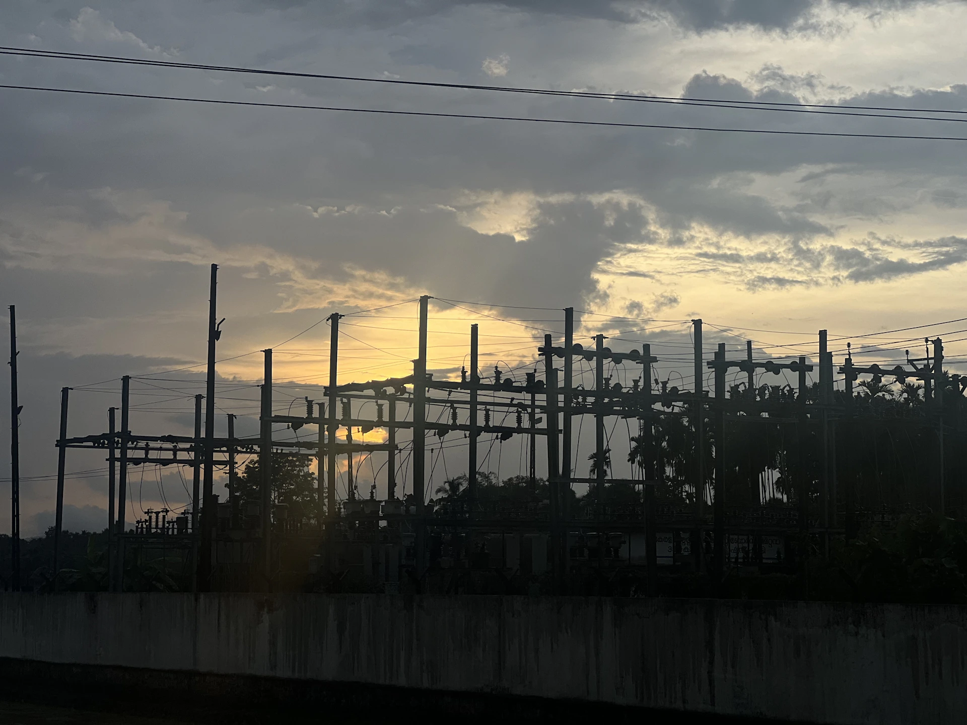 woman wearing yellow long-sleeved dress under white clouds and blue sky during daytime