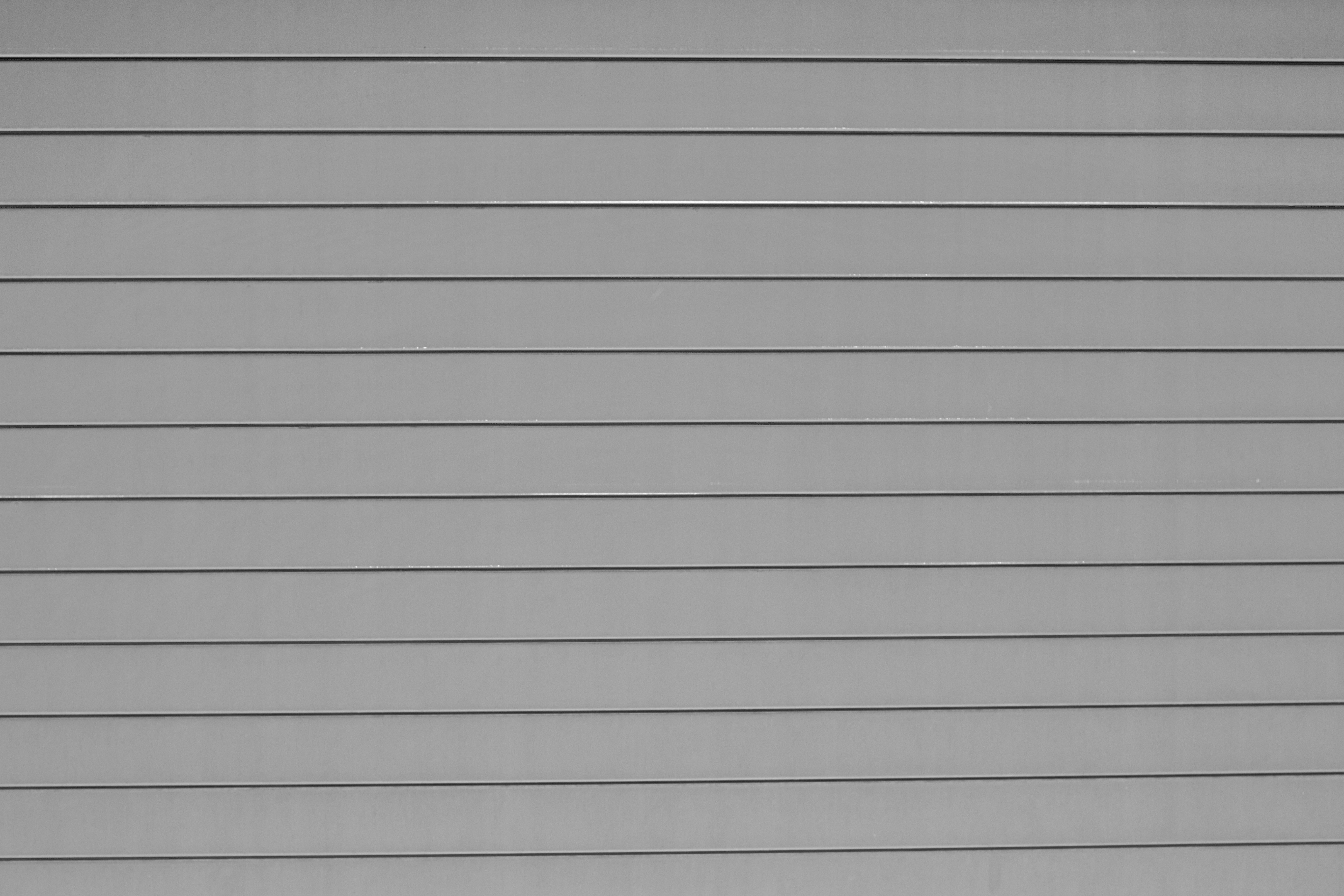 a black and white photo of a person on a skateboard