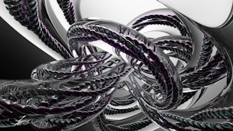 A sleek abstract gold texture with subtle metallic highlights on a dark, obsidian background.