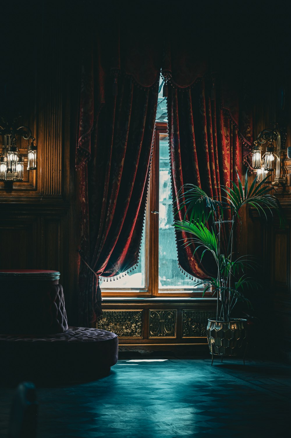 a living room with a couch and a window