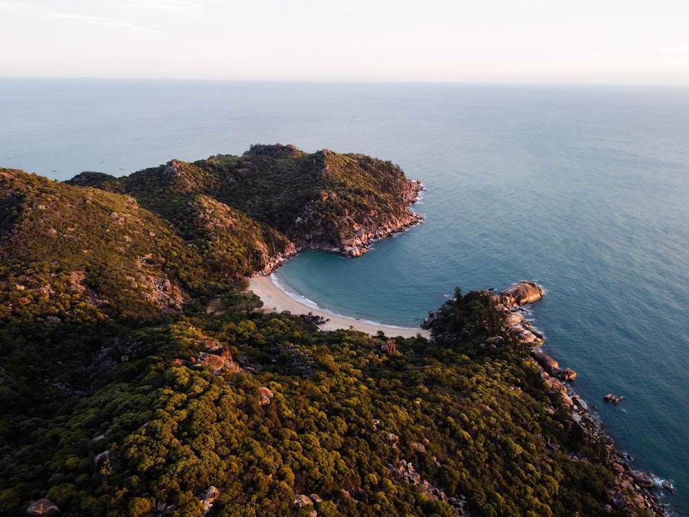 an aerial view of a small island in the middle of the ocean