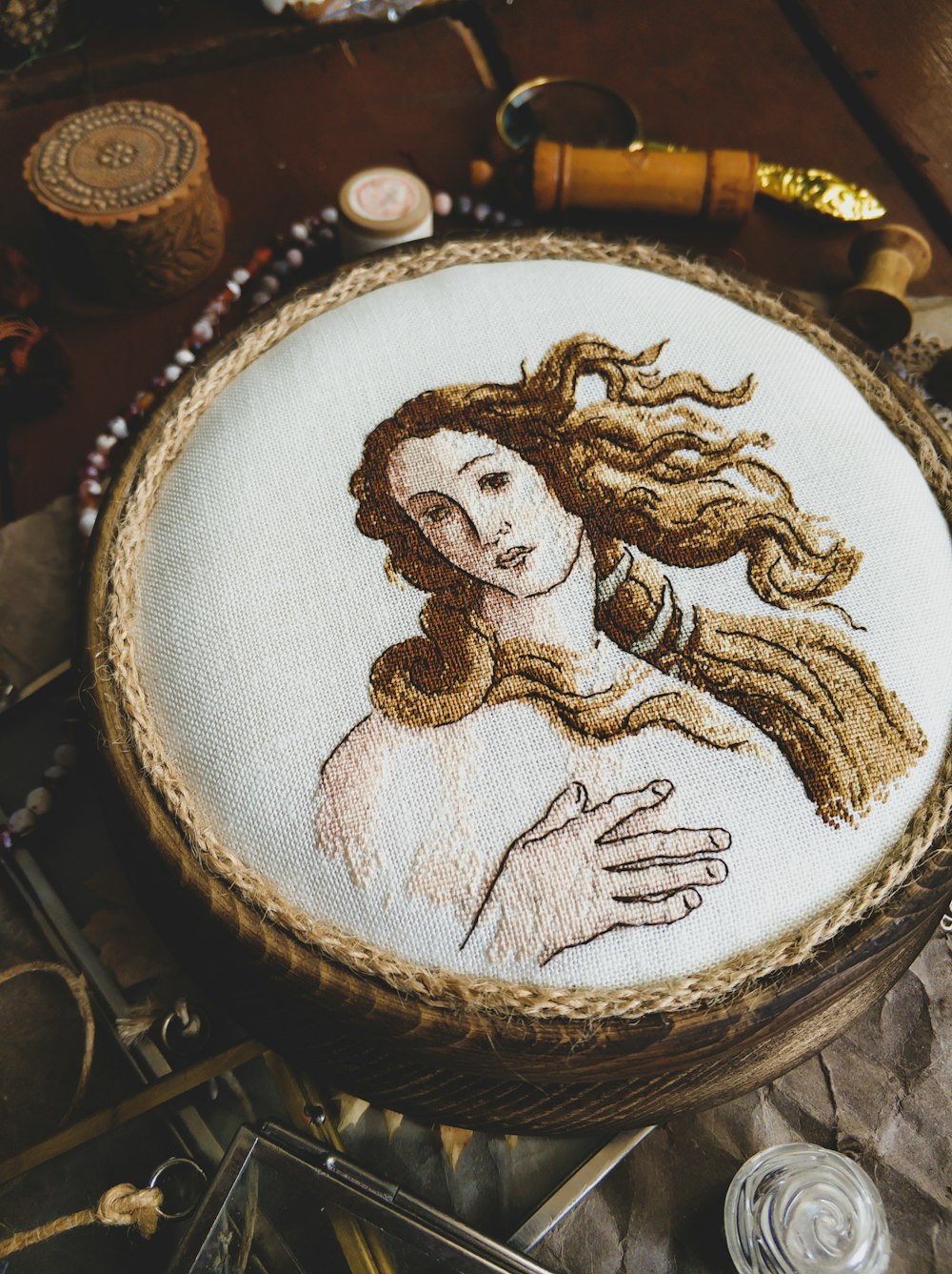 a close up of a embroidery on a table