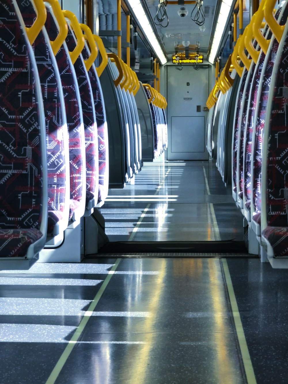 the inside of a public transit bus with its doors open