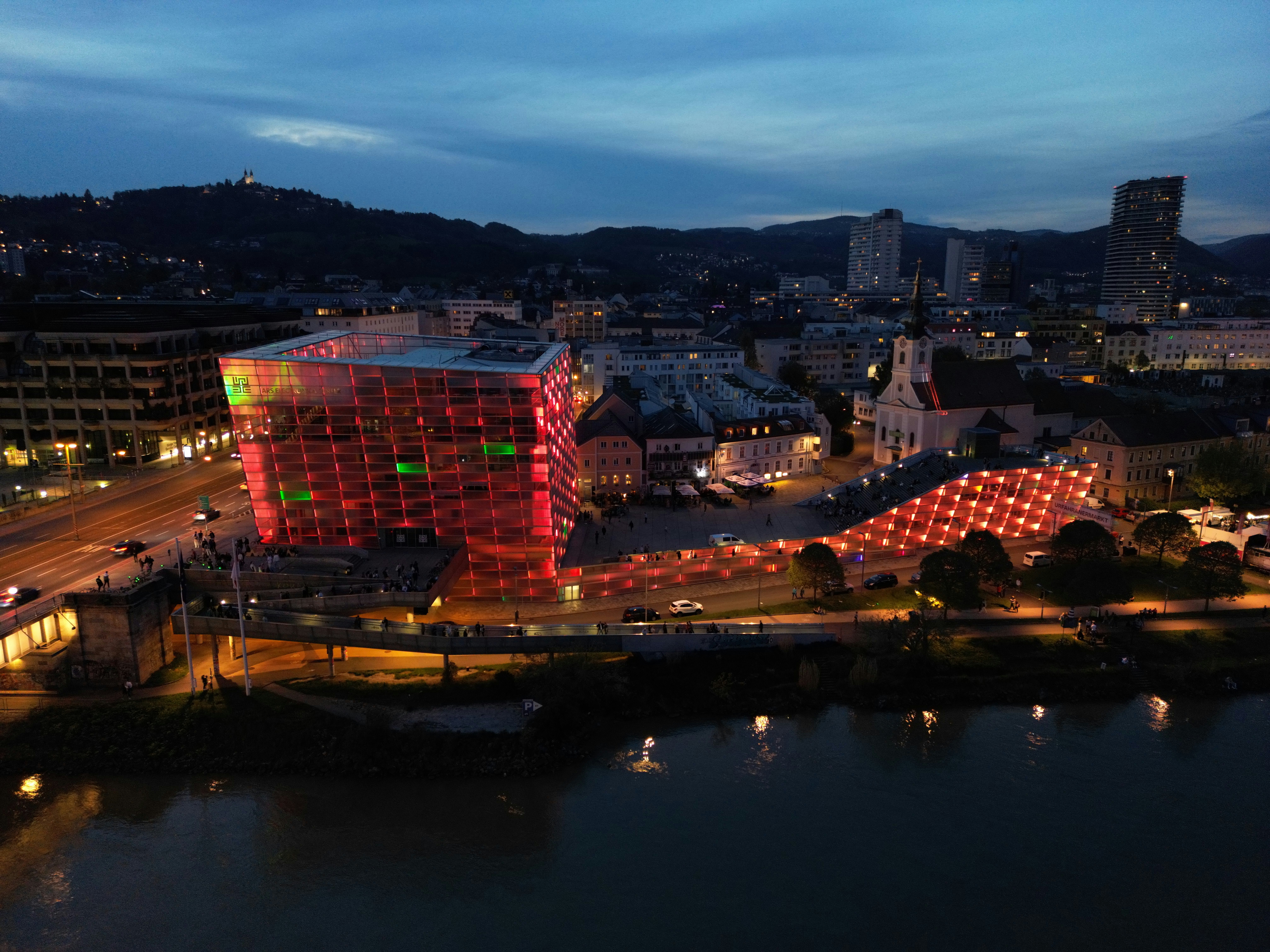 an aerial view of a city at night