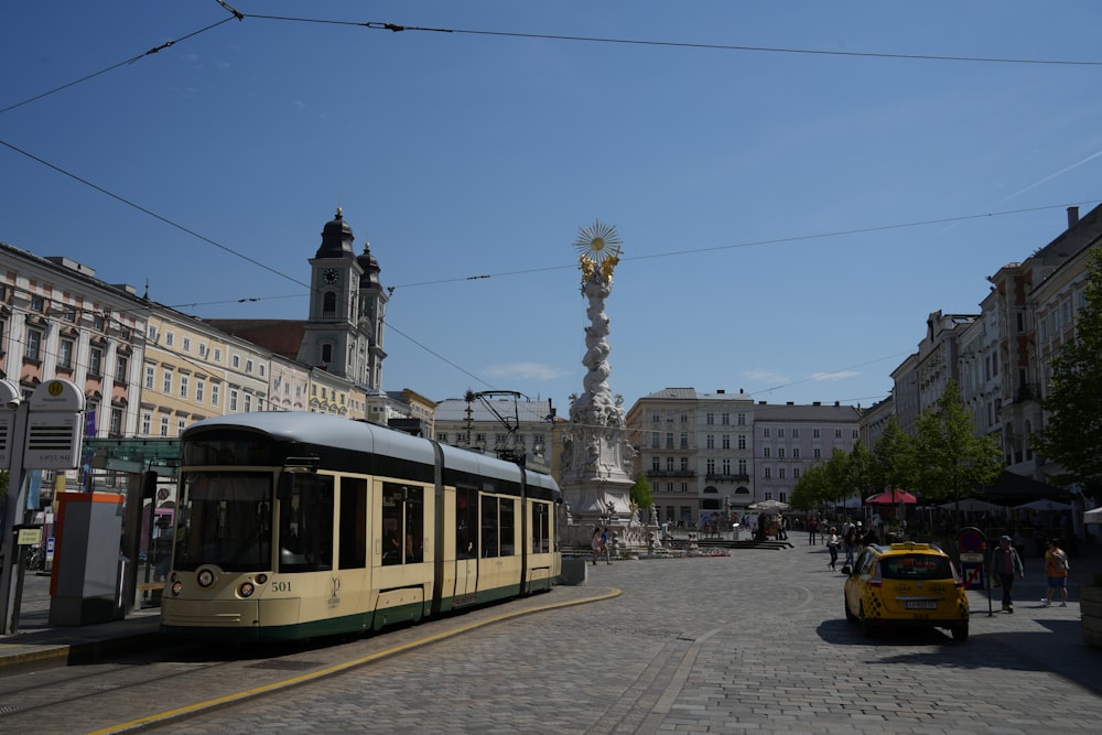 a trolley car on a street in a city