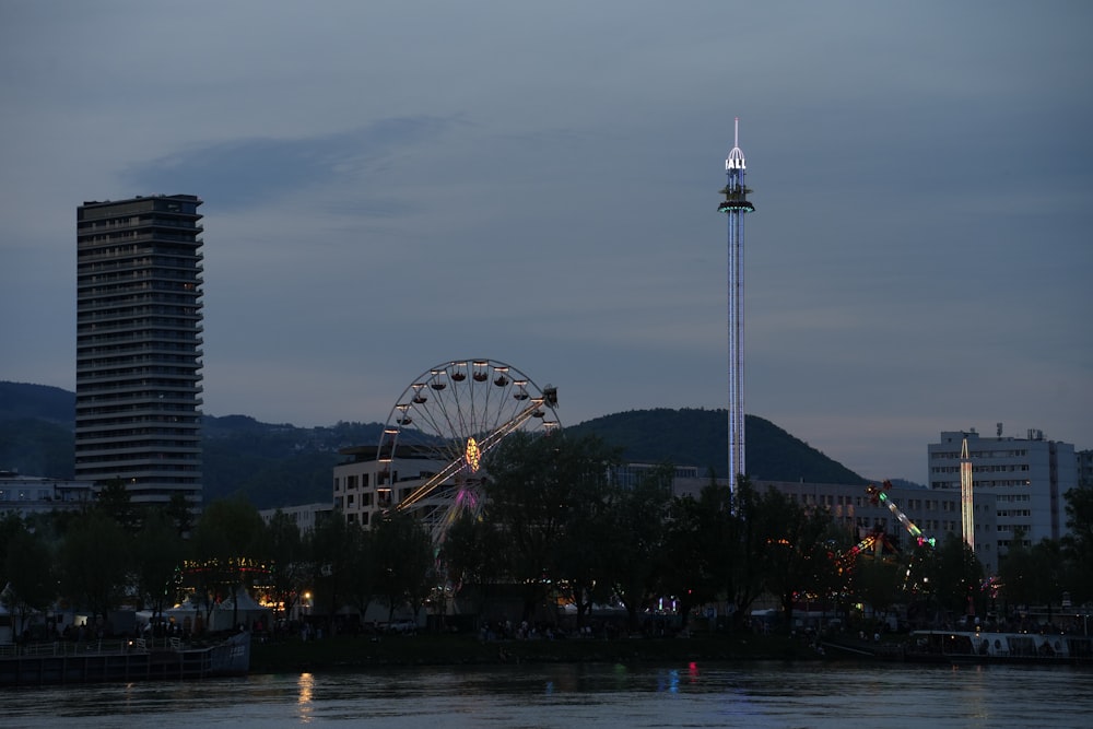 a ferris wheel and a ferris wheel in the distance
