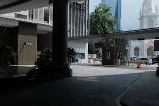 A secure, modern facility entrance with Umbrella Corp. signage in Racoon City.