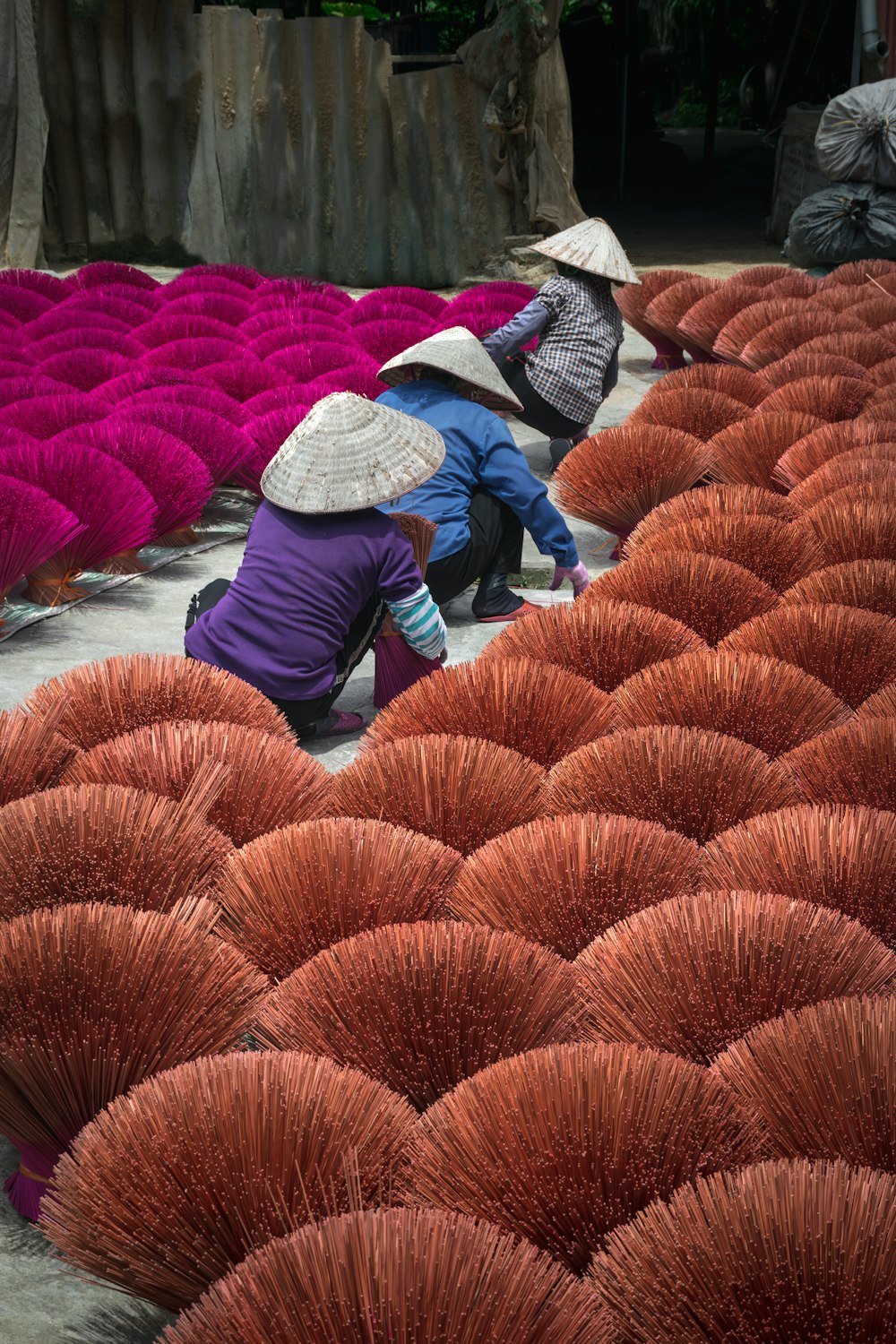 a group of people kneeling down next to each other