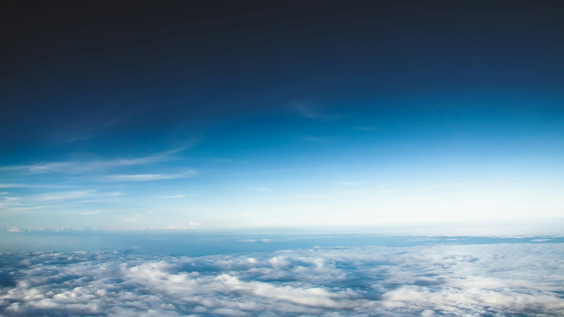 a view of the sky and clouds from an airplane
