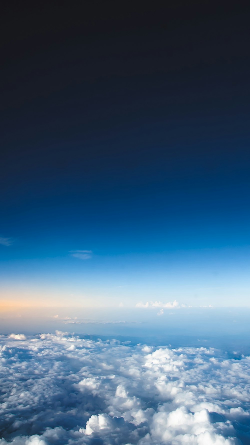 a view of the sky and clouds from an airplane