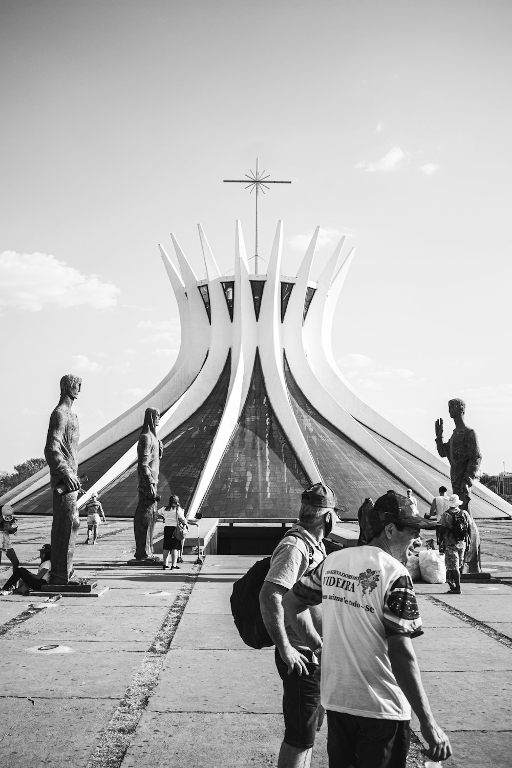 a group of people standing in front of a church