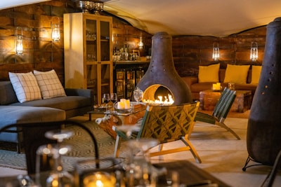 A cozy lounge area with comfortable seating and a warm atmosphere.