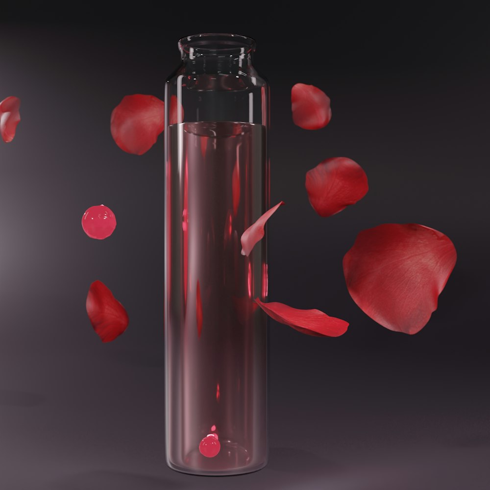 a glass vase with a red liquid inside of it