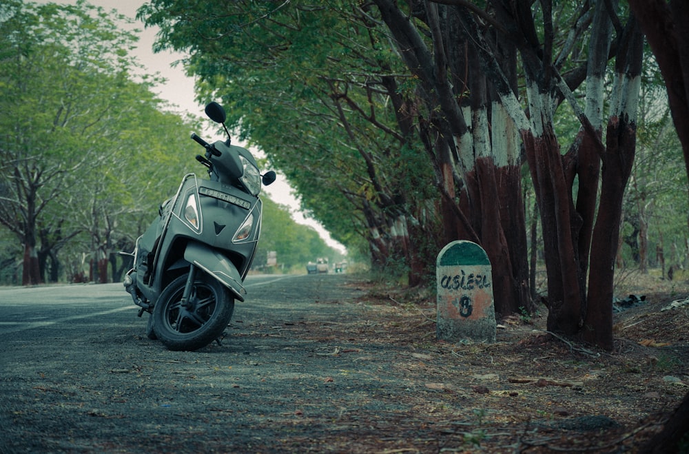 a motorcycle parked on the side of a road