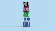 a stack of colorful blocks with social icons on them