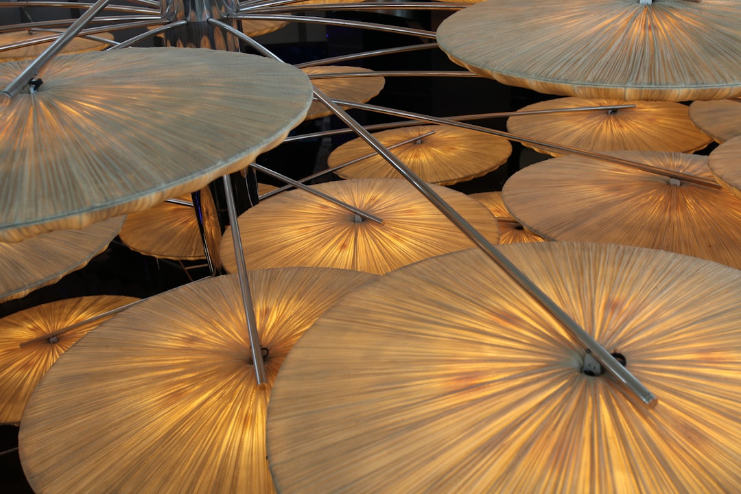 a bunch of umbrellas that are sitting on a table
