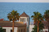 Peaceful outdoor view from the studio window showing Alboraya’s Mediterranean vibe.