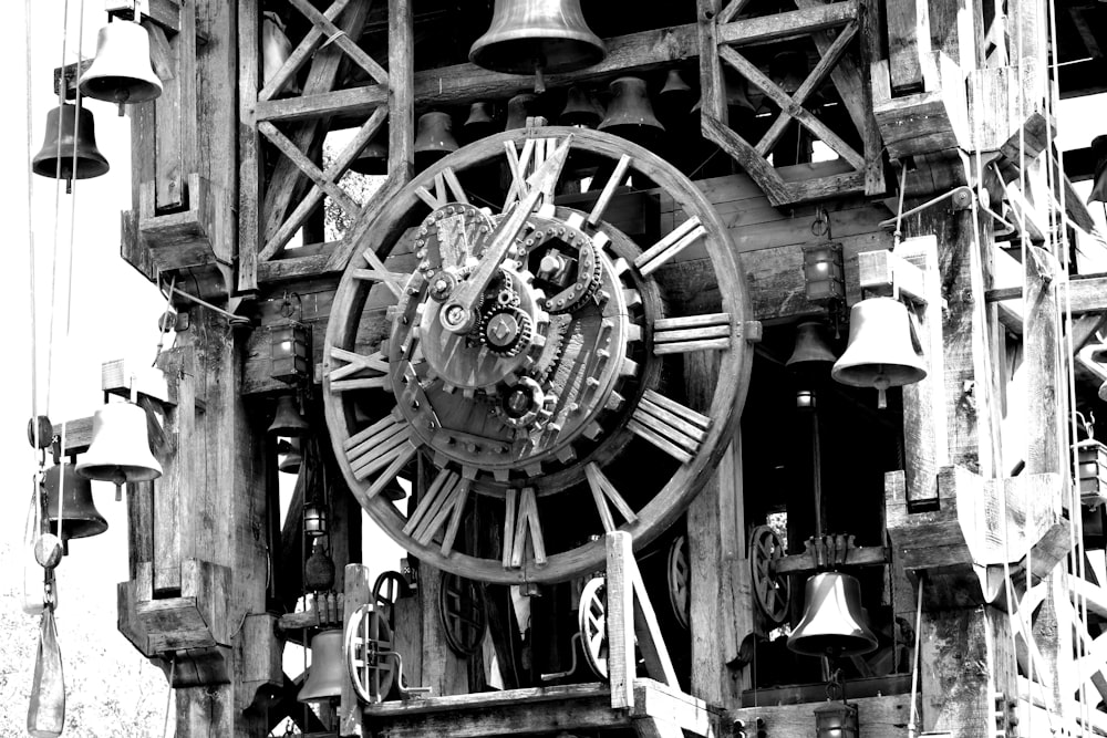 a black and white photo of a large clock