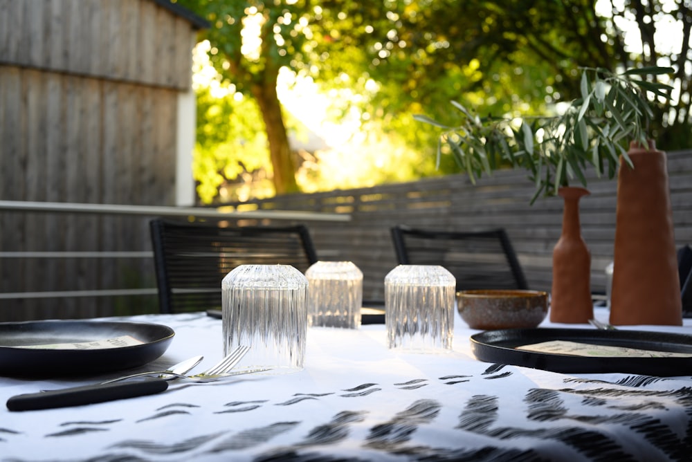 a table with plates and utensils on it