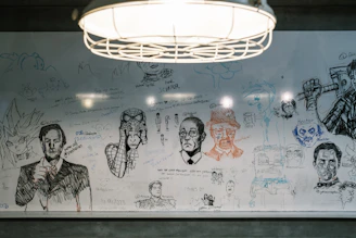 A digital whiteboard filled with AI algorithm sketches and notes.