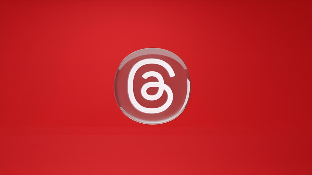 a red background with the number six in the center