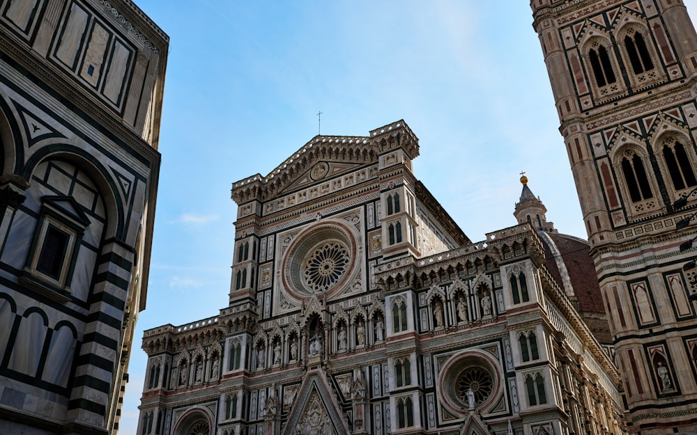 a large cathedral with a clock on the front of it