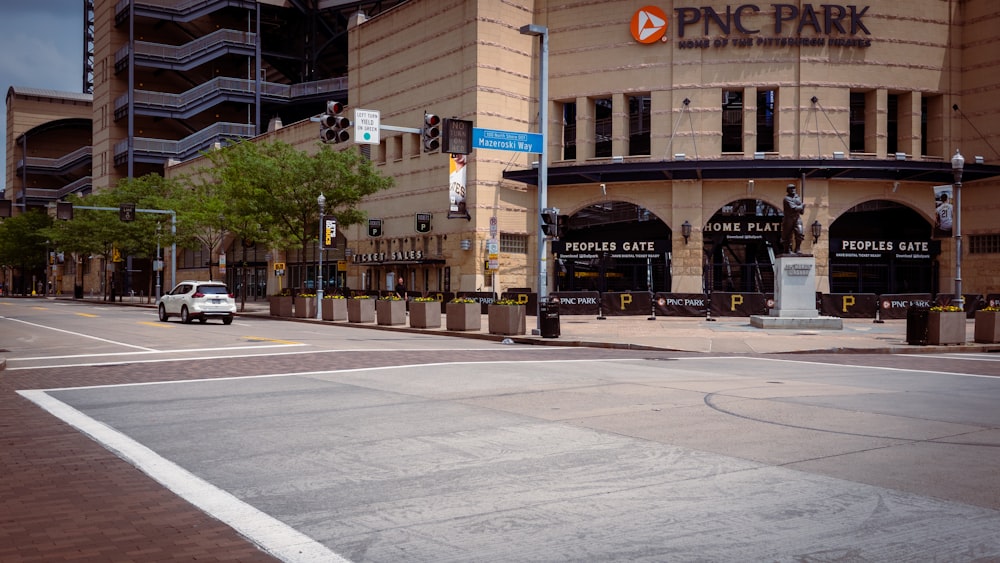 an empty street in front of a parking garage