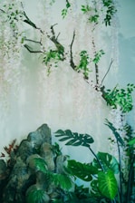 A serene setting with falling petals and botanical textures.