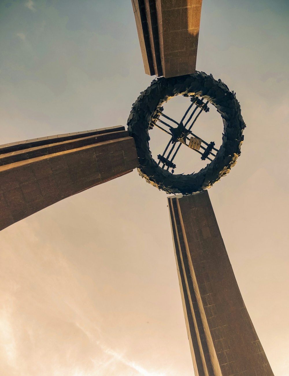 a view of the top of a monument looking up at the sky