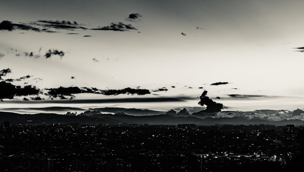 a black and white photo of a city skyline