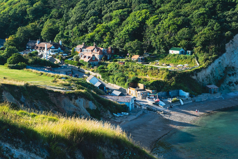 a scenic view of a small village on the edge of a cliff