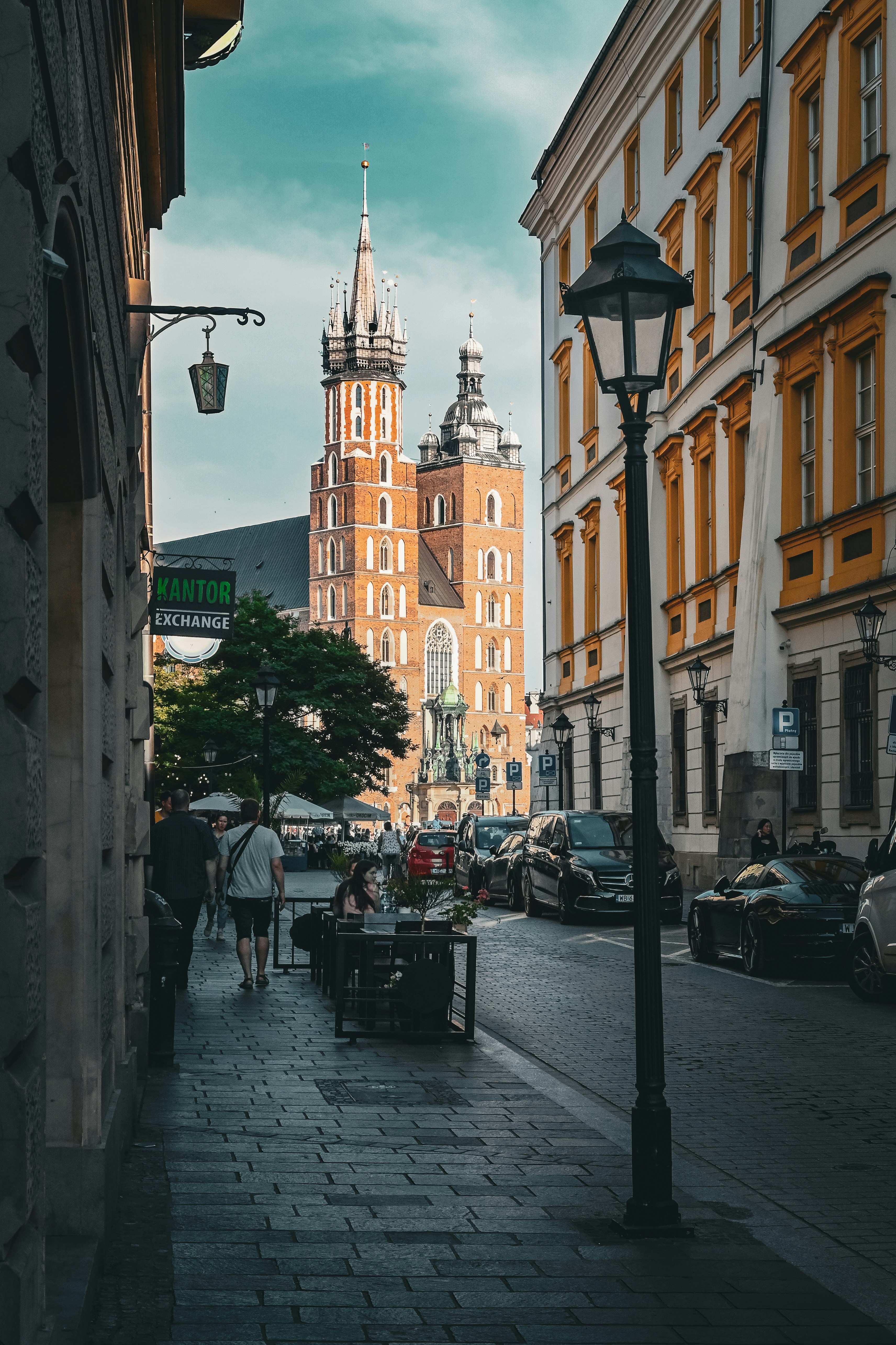 a city street with people walking on it