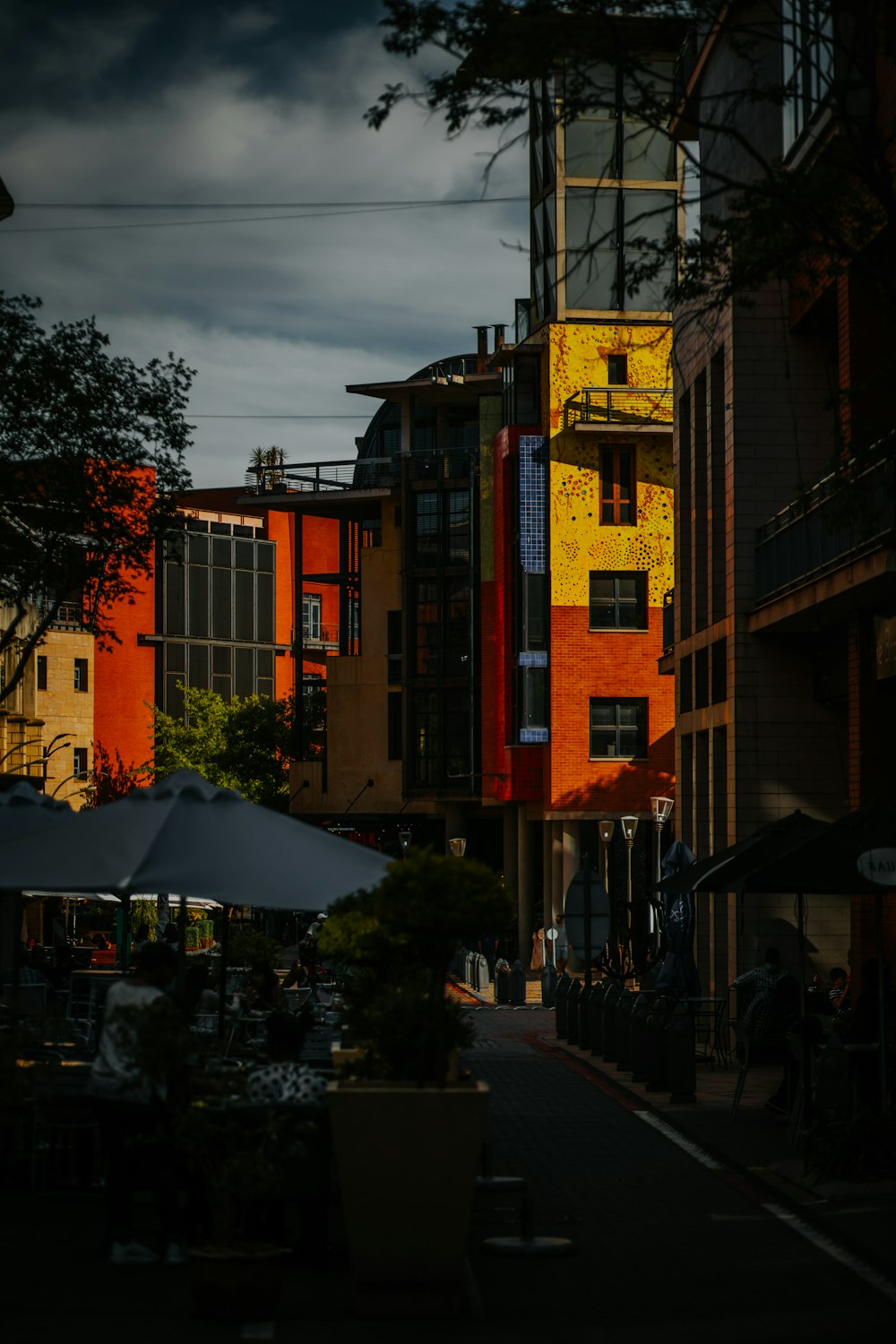 a city street filled with lots of tall buildings