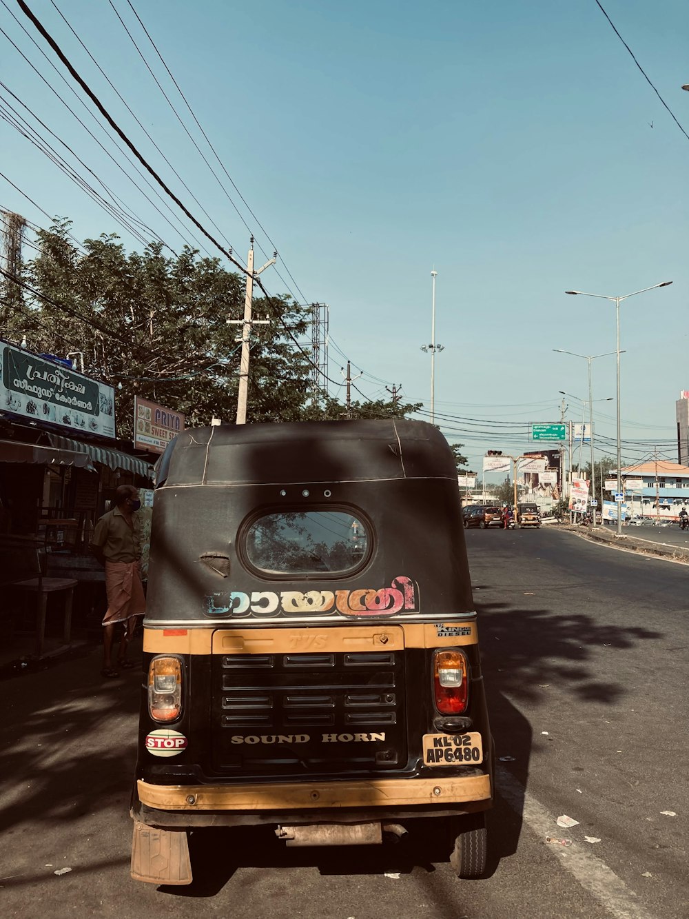 a small truck parked on the side of the road