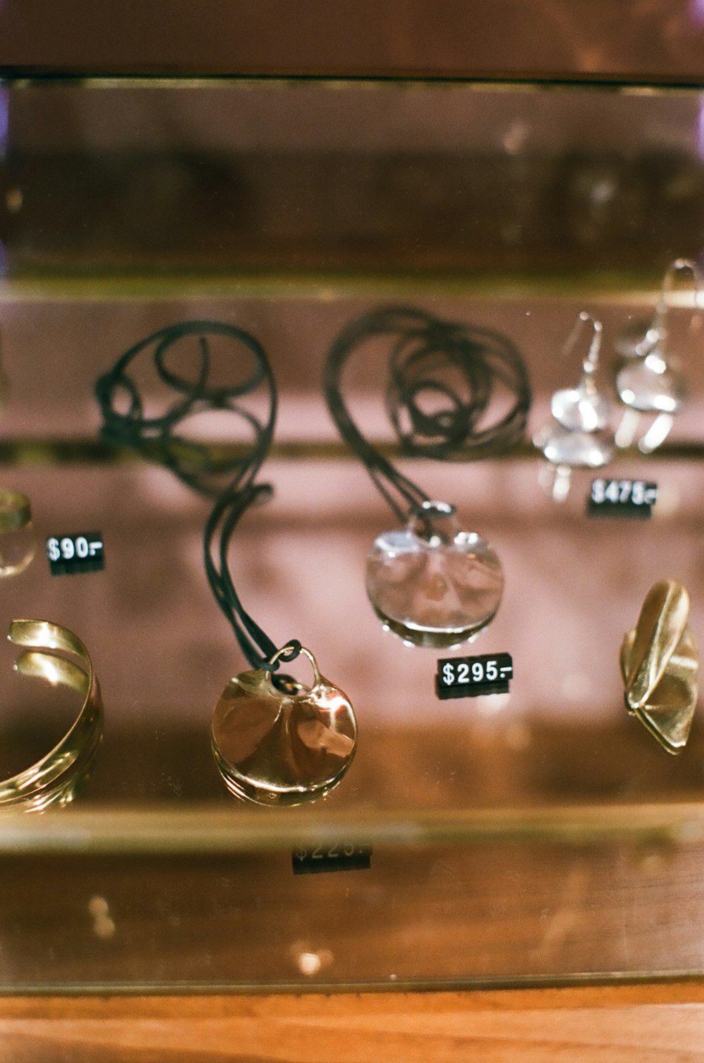 a display case with a bunch of rings on it