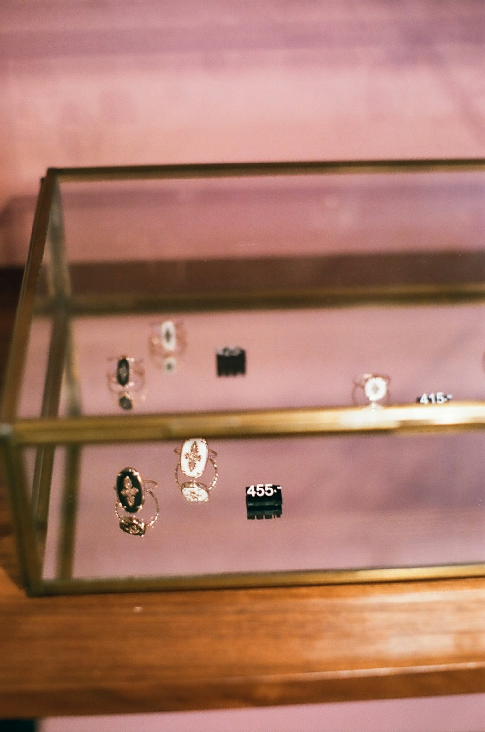 a display case filled with lots of different types of rings
