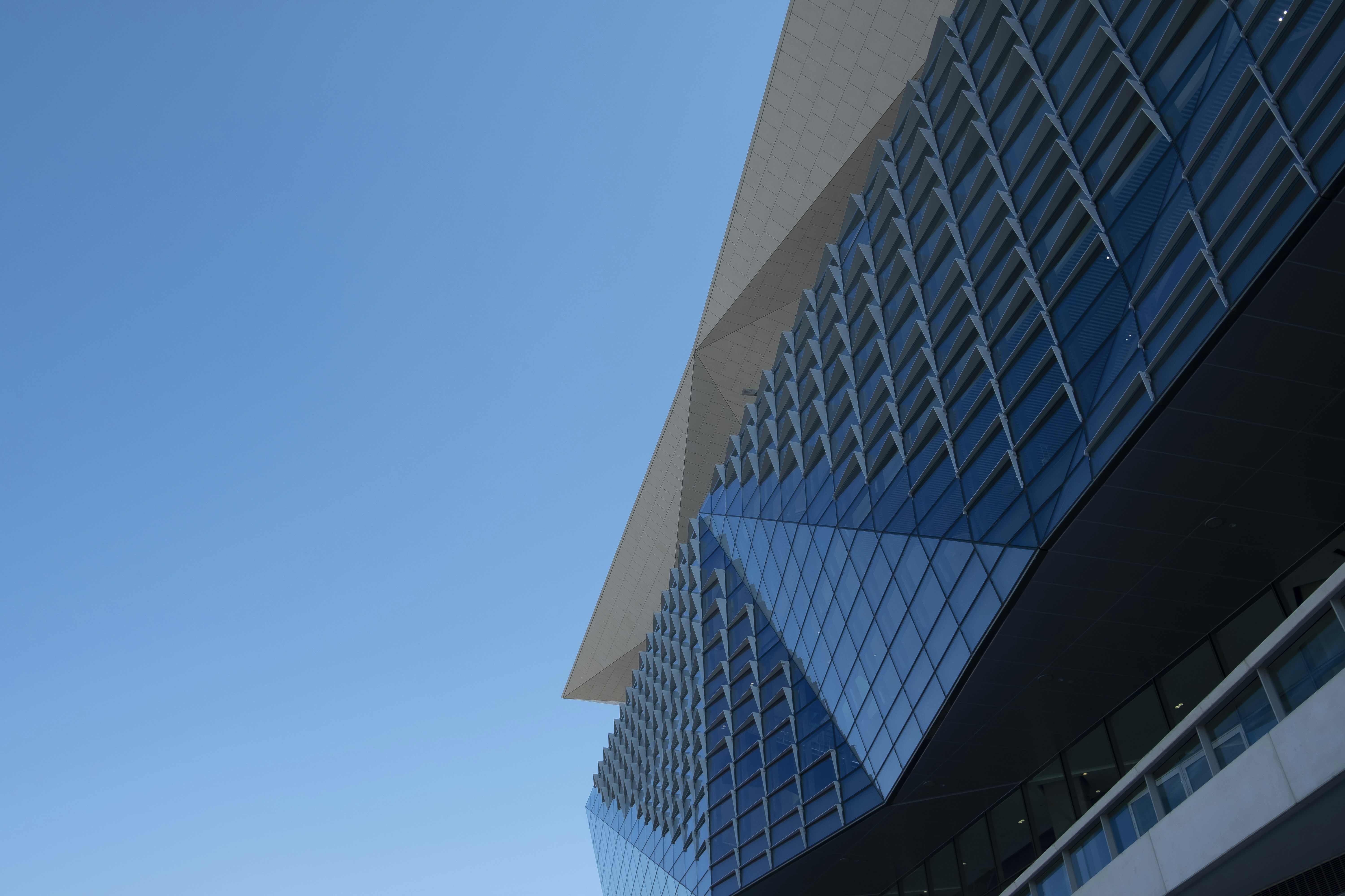 a very tall building next to a very tall building