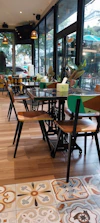 A warm and inviting interior of a modern café with wooden textures.